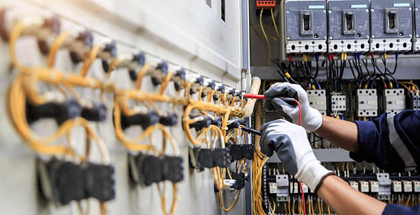 Professional Electrician technician working in Houghton Lake, MI